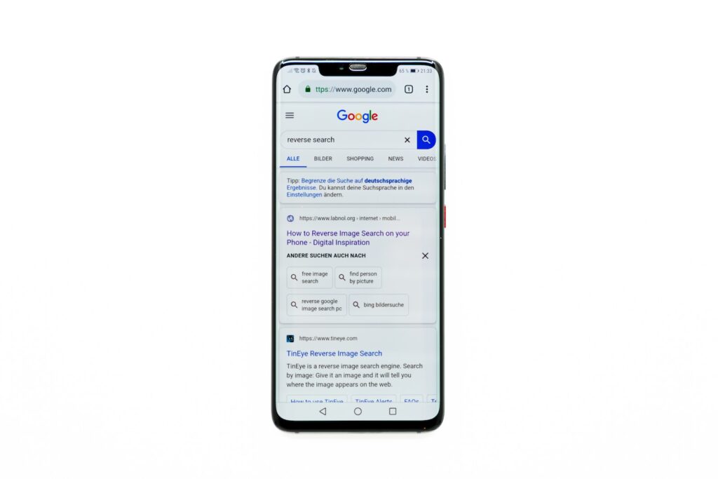 black Android smartphone showing google